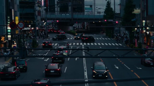 Urban Tokyo Life at Dusk &ndash; Cinematic anamorphic lens captures rush and glowing atmosphere.