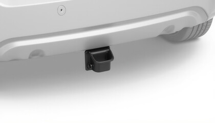 Black tow hitch receiver attached to rear of vehicle bumper  