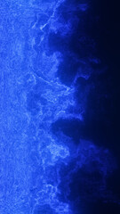 Deep blue abstract texture mimics a glowing coastline or electric wave crashing in darkness