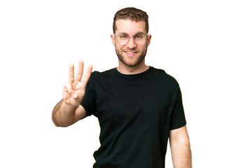 Naklejka premium Young handsome blonde man over isolated chroma key background happy and counting three with fingers