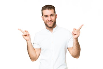 Young handsome blonde man over isolated chroma key background pointing finger to the laterals and happy