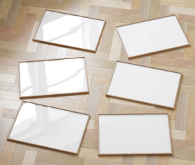 Frame mockup laying on natural parquet floor, 3d render
