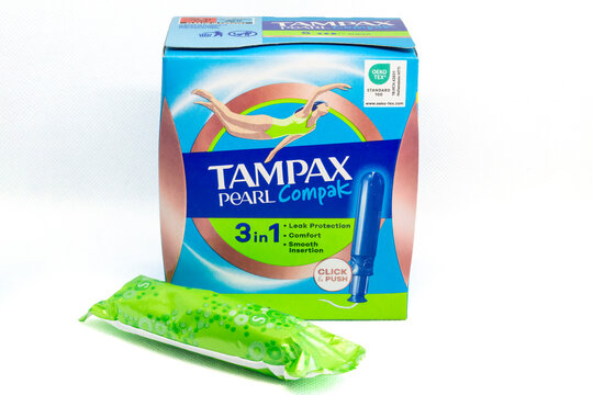 Barcelona, Spain - September 6, 2025: Studio shot of Tampax Pearl Compak tampons box and applicator laying on a white background