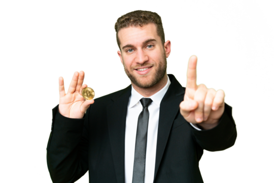 Young business blonde man holding a Bitcoin over isolated chroma key background showing and lifting a finger