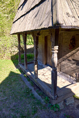  old wooden house with carved porch