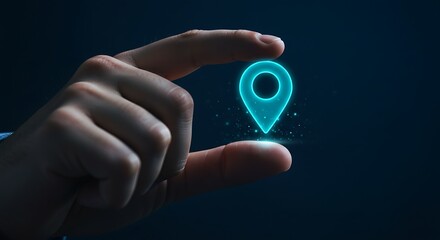 A hand holds a glowing blue map pin icon, representing location, navigation, and pinpointing a destination in a digital interface with a dark background