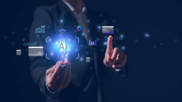 Artificial intelligence technology Innovative technology concept Businessman holding light bulb showing AI text on electronic circuit board ai icon and data charts - Powered by Adobe