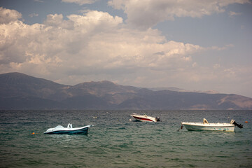 Fototapeta premium Three boats await the bad weather