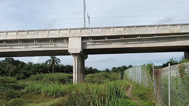 ETS (electric train service)  train  railroad bridge with no train passing by in kluang, johor,  malaysia