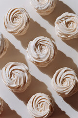 Homemade classic marshmallow zephyr in natural light with strong shadows and texture