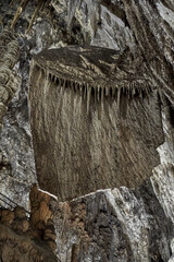 The Artá ​​Caves, overlooking a cliff and with an imposing entrance, are filled with stalactites and stalagmites. One of the stalagmites is 22 meters high. Located in Cap Vermell, Mallorca, Spain.
