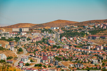 Fototapeta premium August 28, 2025 Yozgat Turkey. Aerial view of Yozgat City in Turkey. View of Yozgat city from Nohutlu Tepe Municipal Facilities.Yozgat State City Hospital is visible.