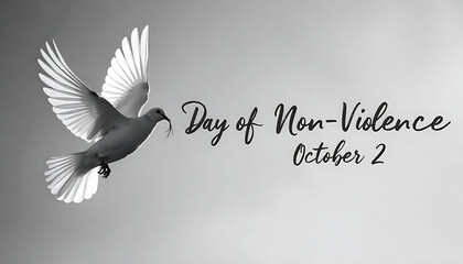 A grayscale dove in flight with the text “Day of Non-Violence October 2” on a soft gray background