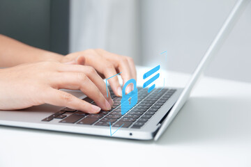 Hands typing on laptop keyboard to log in to a system. Concept of online security, password access, authentication, digital technology, and data protection