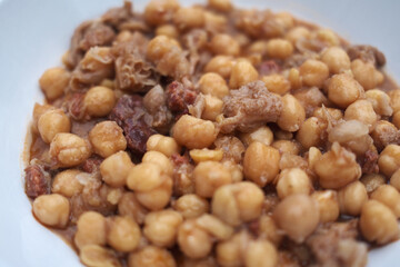 pig tryp dish as typical spanish tapas food with chickpeas