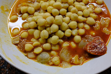 pig tryp dish as typical spanish tapas food with chickpeas