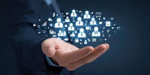 Close-up of a hand holding glowing icons of people and other symbols against a navy background, representing business connections and networking