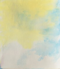 A yellow and blue background with a splash of white
