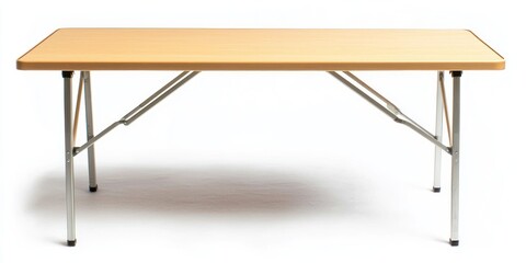 A light-colored, rectangular folding table stands on a white surface. The table has a wooden top and silver-colored folding legs. 