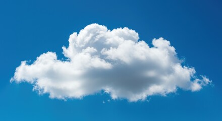 A single, fluffy cumulus cloud floats against a vibrant blue sky.