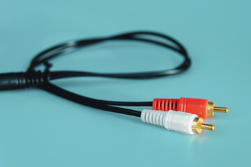 RCA audio cable with red and white connectors, a common accessory for connecting sound and video...