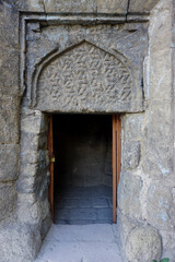 13 July 2025 Erzurum Turkey. Historical clock tower tepsi minaret from Saltuk era in city center with architectural details and war artifacts