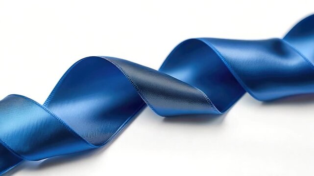 A close-up shot of a blue ribbon on a white surface