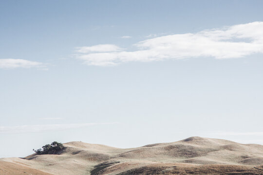 Dry, rolling hills with big blue sky