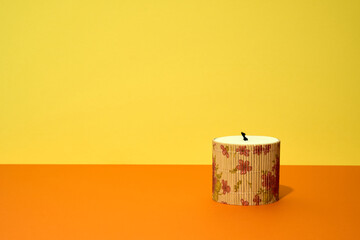 Flower painted wooden handmade box on yellow background.