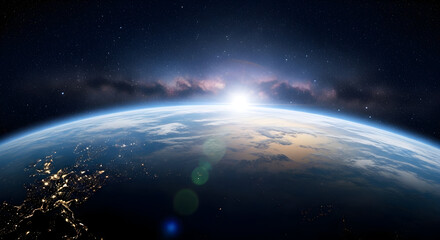 Spectacular sunrise over Earth from space illuminating the atmosphere beautifully showcasing city