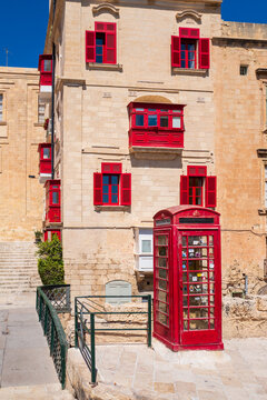 street in the old town with red postbox