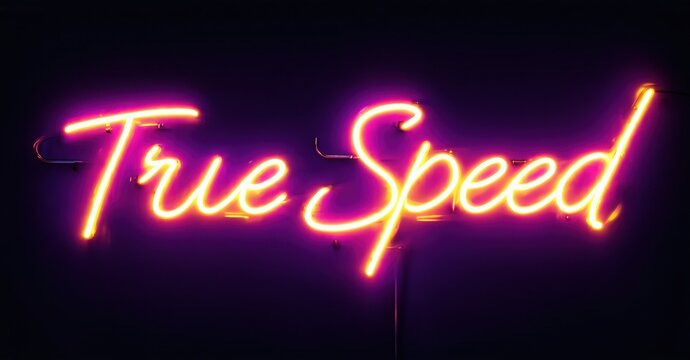 Bright pink neon sign displays cursive text reading True Speed against dark background. Simple, vibrant, modern aesthetic.