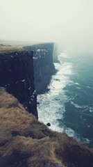 Towering Cliffs of Moher in Ireland, Majestic and Misty, with Crashing Atlantic Ocean Waves
