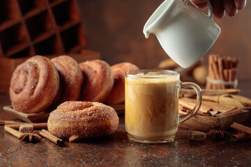 Swedish cinnamon rolls and coffee latte.