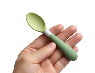 Feeding action with green spoon baby care context home environment view isolated on transparent background, png