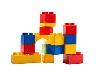 Colorful plastic building blocks arranged in a miniature structure, featuring red, yellow, and blue colors