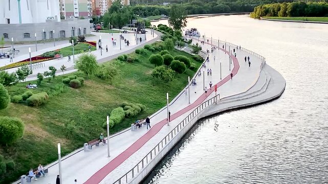 Embankment in the park jogging track Landscaping A place to relax in the city