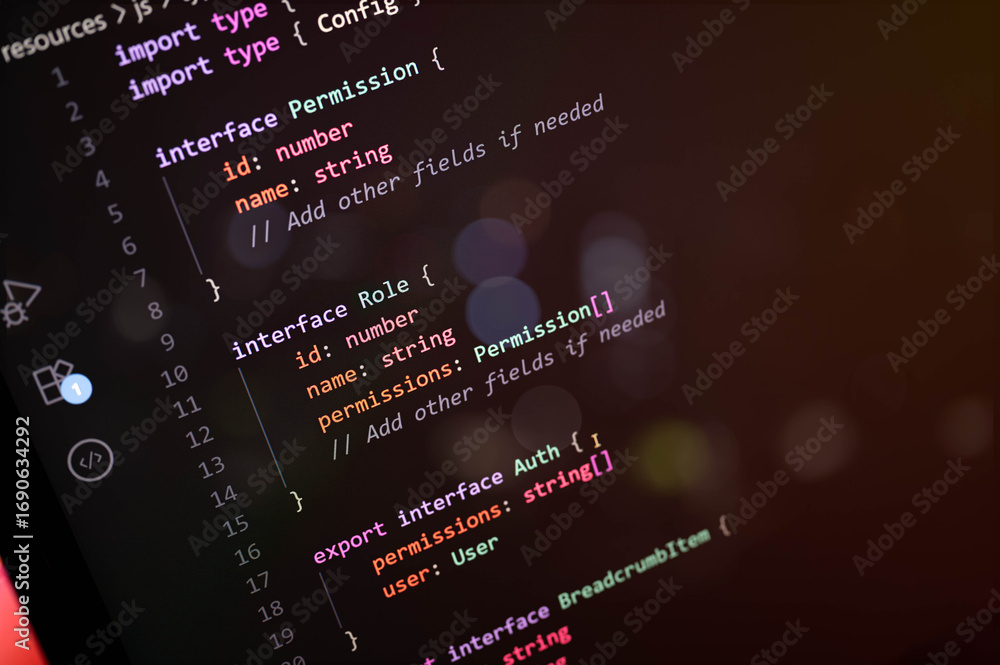 Fototapete high-resolution close-up of typescript code defining interfaces for permissions, roles, and user aut