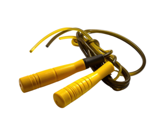 Yellow jump rope with dark handles, lying diagonally