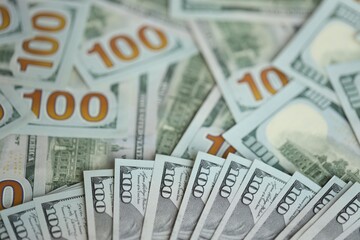 Big amount of american USD hunderd dollar bills banknotes close up
