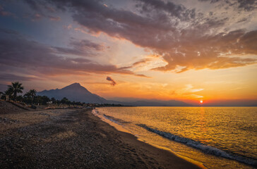 Sunset on the beach of the city of Campofelice di Rosaria in northwestern Sicily. August 2024. Long exposure picture.