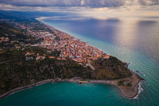 Capo d'Orlando in Italy, Sicily island during sunset. Capo d'Orlando is a community in the province of Messina, Sicily, Italy. August 2024. Aerial drone picture