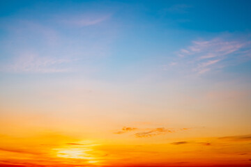 Beautiful , luxury soft gradient orange gold clouds and sunlight on the blue sky perfect for the background, take in evening,Twilight, Large size, high definition landscape photo
