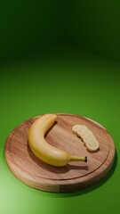 Banana and slice arrangement on cutting board with green background