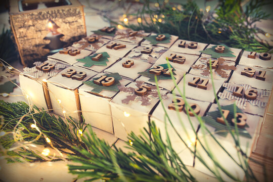 Christmas and advent calendar. Environmentally friendly homemade cardboard gift wrapping. Upcycling concept.