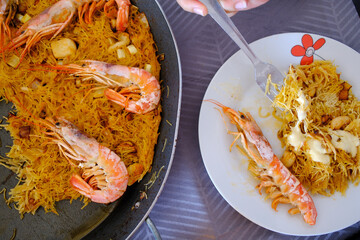 noodle fish dish as spanish food