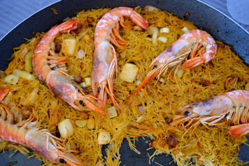 noodle fish dish as spanish food