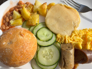 A typical breakfast at the hotel with egg, beans