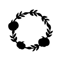 Silhouette of pumpkins and leaves arranged in a circular autumnal wreath