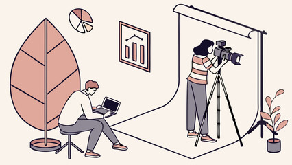 Studio Photography Session Photographer with Camera and Assistant with Laptop.